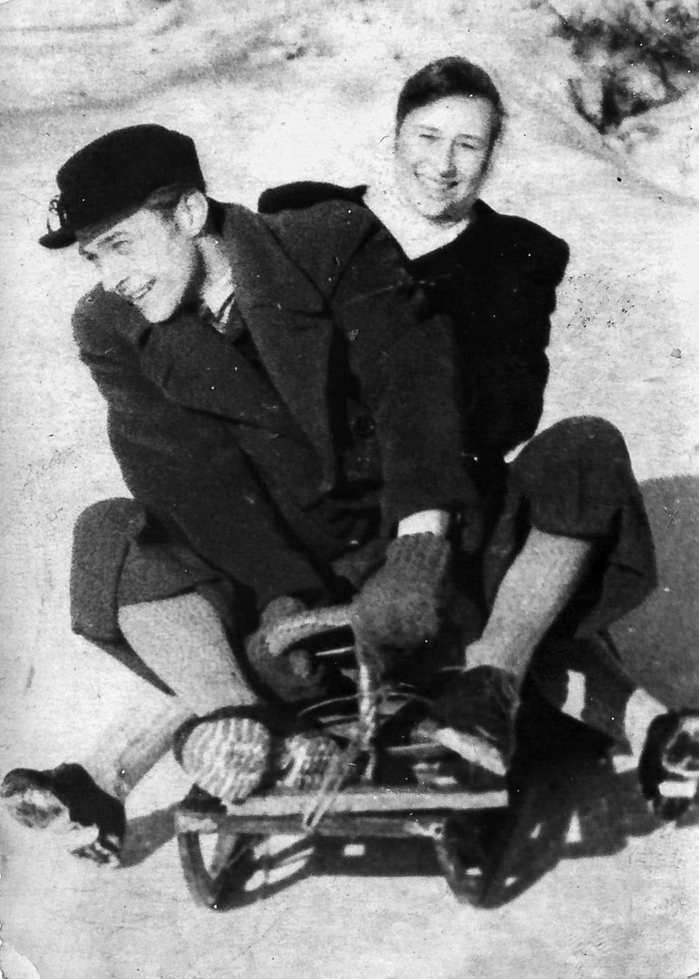 Vasyl Habda with his wife sledding
